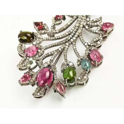 150 - A TREE OF LIFE BROOCH, set with multi-coloured cabouchon tourmalines, diamond encrusted frame,
6cm h... 