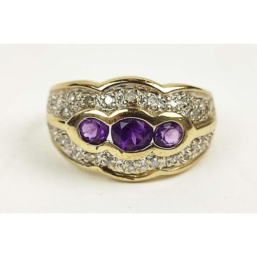 151 - A 9CT GOLD GENTS AMETHYST AND DIAMOND DRESS RING, with three oval cut amethysts and
interspaced with... 