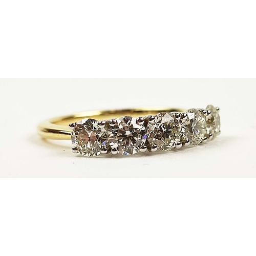 161 - AN 18CT GOLD FIVE STONE DIAMOND RING, all stones brilliant cut, clarity VS1 to VS2, ring size M, com... 