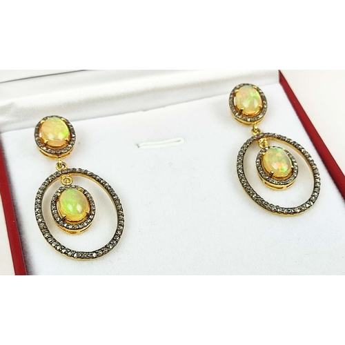 162 - A PAIR OF OPAL SET ARTICULATED DROPLET EARRINGS, each with two opal cabouchons, diamond set surround... 