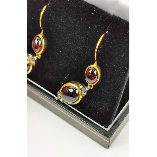 164 - A PAIR OF GARNET HOOK PENDANT EARRINGS, each earring set with two garnet cabouchons and trefoil diam... 