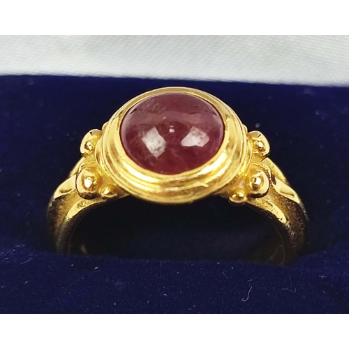 172 - MASSIMO MARIA MELIS, Italian 20ct gold Roman revival ruby ring, the cabochon ruby set in a closed ba... 