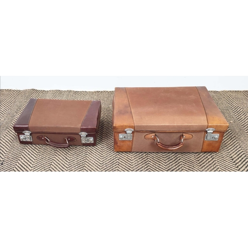 19 - VINTAGE LEATHER SUITCASE, 60cm x 20cm x 40cm and two leather and canvas small suitcases with silver ... 