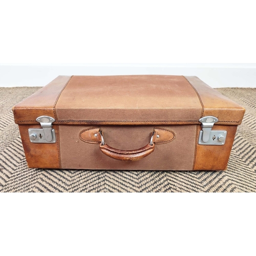 19 - VINTAGE LEATHER SUITCASE, 60cm x 20cm x 40cm and two leather and canvas small suitcases with silver ... 