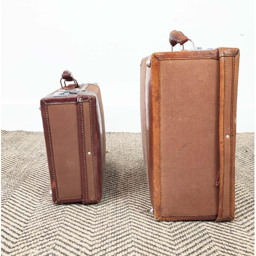 19 - VINTAGE LEATHER SUITCASE, 60cm x 20cm x 40cm and two leather and canvas small suitcases with silver ... 