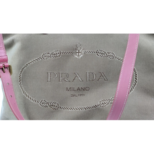 21 - PRADA TOTE BAG, canvas with embroidered front jacquard logo and leather begonia colour trims, handle... 