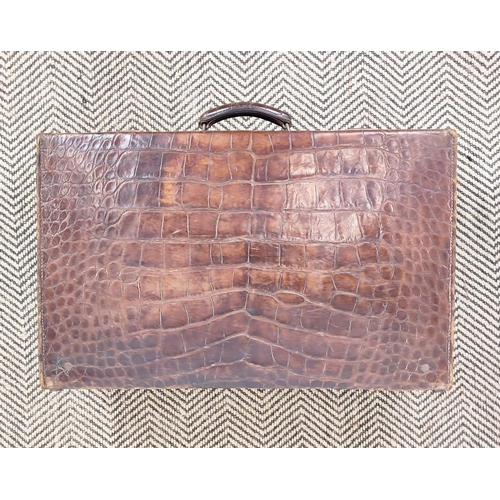 24 - CROCODILE VINTAGE SUITCASE, with leather interior, bottom feet, 61cm x 39cm x 8cm.