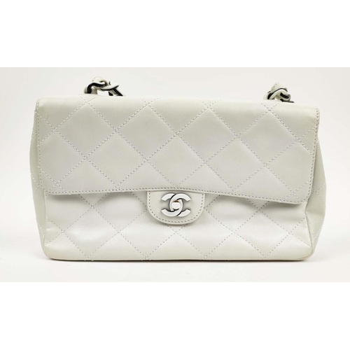 26 - CHANEL VINTAGE FLAP BAG, white leather with matching white leather lining, authenticity card, black ... 