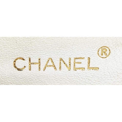 26 - CHANEL VINTAGE FLAP BAG, white leather with matching white leather lining, authenticity card, black ... 