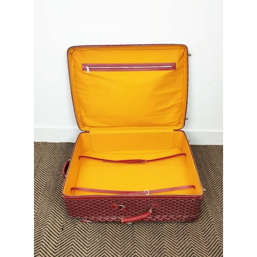 3 - GOYARD TROLLEY, iconic Goyardine red coated canvas exterior with leather trimming and handles, retra... 