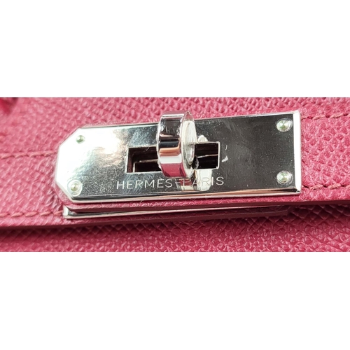 34 - HERMÈS BIRKIN 35 ROUGE, palladium hardware, top handles, color matching leather lining, one zip pock... 