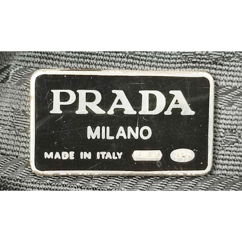 37 - PRADA VINTAGE TOTE BAG, with top knot on strap, top zip closure and logo on the side, 37cm x 15cm x ... 