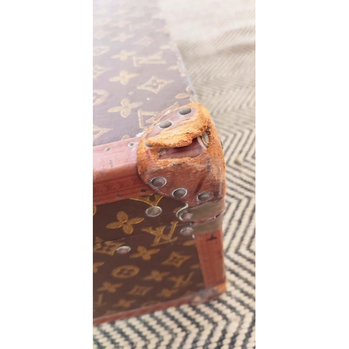 39 - LOUIS VUITTON VINTAGE HARD SUITCASE, monogrammed with leather handles and trims with decorative blue... 