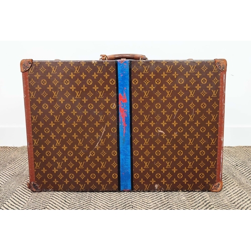 39 - LOUIS VUITTON VINTAGE HARD SUITCASE, monogrammed with leather handles and trims with decorative blue... 