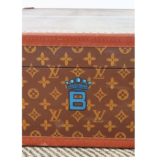 39 - LOUIS VUITTON VINTAGE HARD SUITCASE, monogrammed with leather handles and trims with decorative blue... 