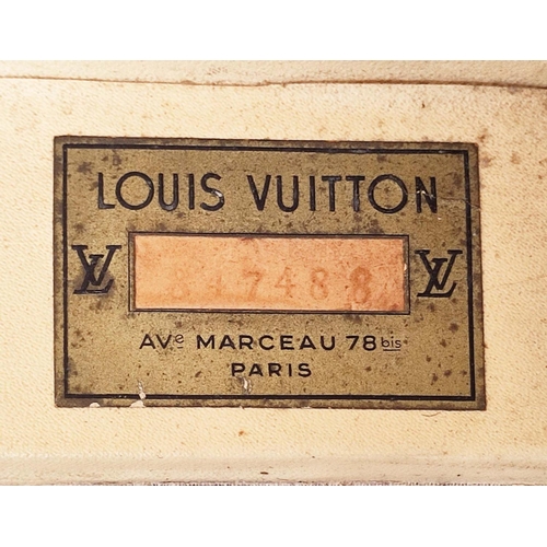 39 - LOUIS VUITTON VINTAGE HARD SUITCASE, monogrammed with leather handles and trims with decorative blue... 