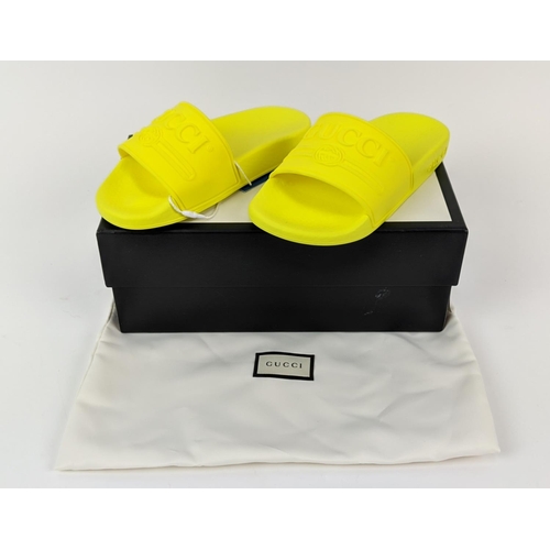 45 - GUCCI JUNIOR LOGO RUBBER SLIDERS, yellow fluo, embossed logo, rubber sole, made in Italy, size 27, w... 