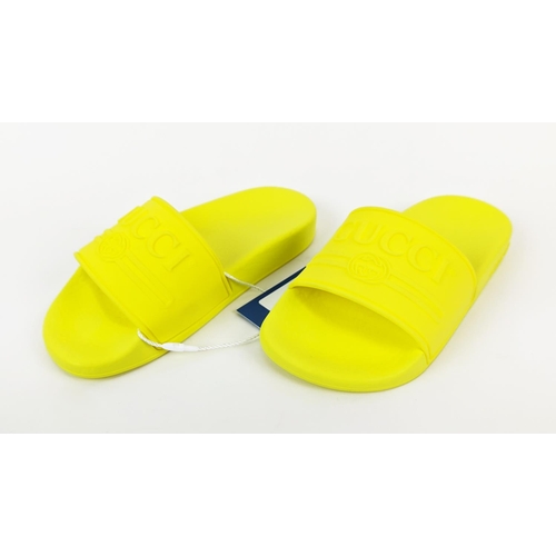 45 - GUCCI JUNIOR LOGO RUBBER SLIDERS, yellow fluo, embossed logo, rubber sole, made in Italy, size 27, w... 