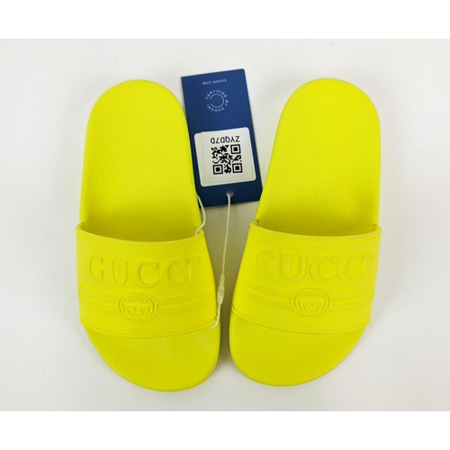 45 - GUCCI JUNIOR LOGO RUBBER SLIDERS, yellow fluo, embossed logo, rubber sole, made in Italy, size 27, w... 