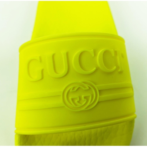 45 - GUCCI JUNIOR LOGO RUBBER SLIDERS, yellow fluo, embossed logo, rubber sole, made in Italy, size 27, w... 