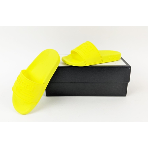 47 - GUCCI JUNIOR LOGO RUBBER SLIDERS, yellow fluo, embossed logo, rubber sole, made in Italy, size 27, w... 