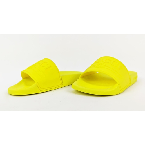 47 - GUCCI JUNIOR LOGO RUBBER SLIDERS, yellow fluo, embossed logo, rubber sole, made in Italy, size 27, w... 