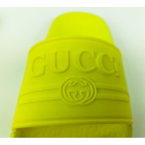 47 - GUCCI JUNIOR LOGO RUBBER SLIDERS, yellow fluo, embossed logo, rubber sole, made in Italy, size 27, w... 