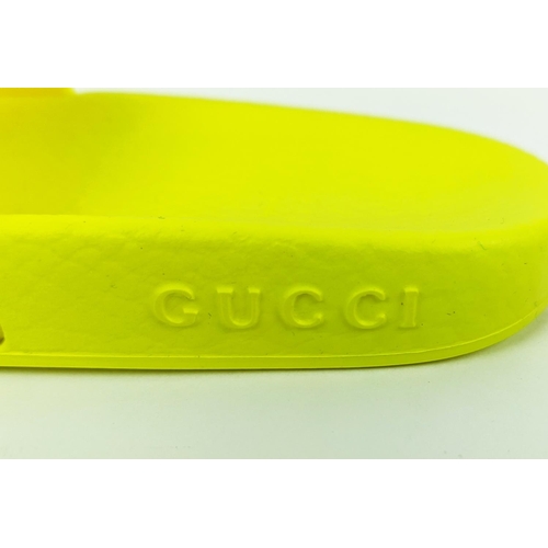 47 - GUCCI JUNIOR LOGO RUBBER SLIDERS, yellow fluo, embossed logo, rubber sole, made in Italy, size 27, w... 