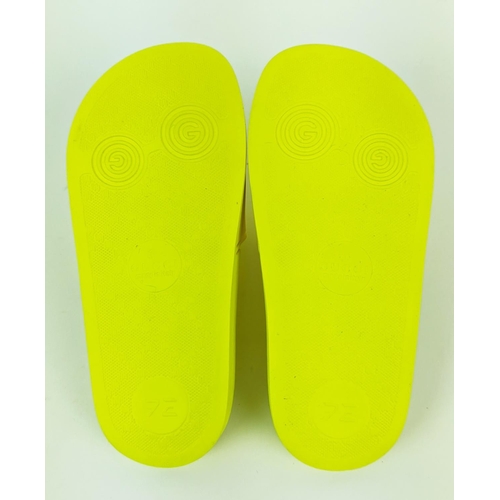 47 - GUCCI JUNIOR LOGO RUBBER SLIDERS, yellow fluo, embossed logo, rubber sole, made in Italy, size 27, w... 