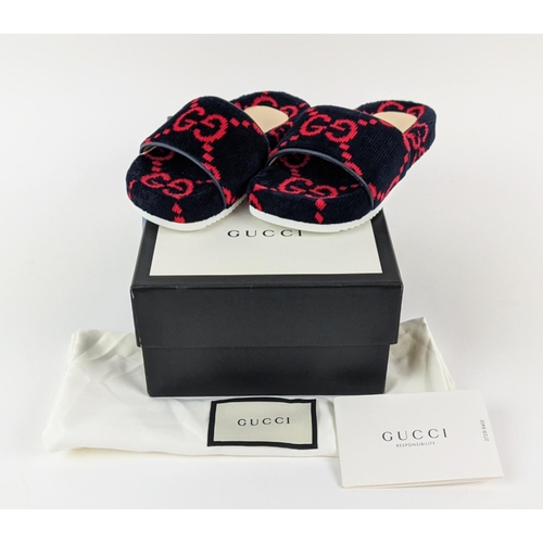 48 - GUCCI KIDS TOWELLING SLIDERS, monogrammed, made in Italy, with box and dust bag, size 27.