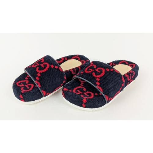 48 - GUCCI KIDS TOWELLING SLIDERS, monogrammed, made in Italy, with box and dust bag, size 27.