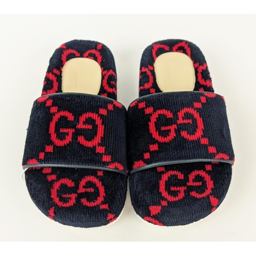 48 - GUCCI KIDS TOWELLING SLIDERS, monogrammed, made in Italy, with box and dust bag, size 27.