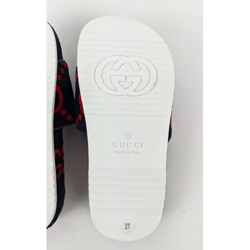 48 - GUCCI KIDS TOWELLING SLIDERS, monogrammed, made in Italy, with box and dust bag, size 27.