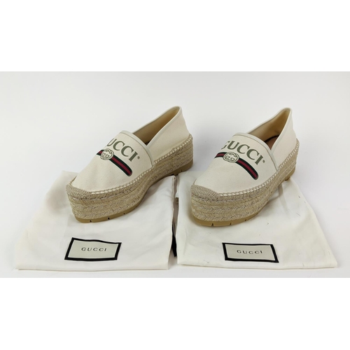 5 - GUCCI CREAM VINTAGE LOGO PRINT CANVAS SYLVIE DOUBLE PLATFORM ESPADRILLES, leather trim, rubber sole,... 