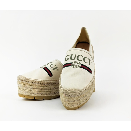 5 - GUCCI CREAM VINTAGE LOGO PRINT CANVAS SYLVIE DOUBLE PLATFORM ESPADRILLES, leather trim, rubber sole,... 