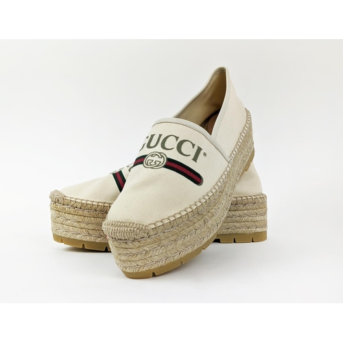 5 - GUCCI CREAM VINTAGE LOGO PRINT CANVAS SYLVIE DOUBLE PLATFORM ESPADRILLES, leather trim, rubber sole,... 