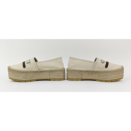 5 - GUCCI CREAM VINTAGE LOGO PRINT CANVAS SYLVIE DOUBLE PLATFORM ESPADRILLES, leather trim, rubber sole,... 