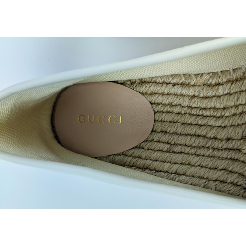 5 - GUCCI CREAM VINTAGE LOGO PRINT CANVAS SYLVIE DOUBLE PLATFORM ESPADRILLES, leather trim, rubber sole,... 