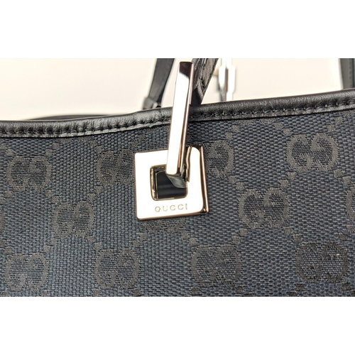 58 - GUCCI VINTAGE TOTE BAG, with iconic GG monogram canvas with leather trims and handles, silver tone h... 