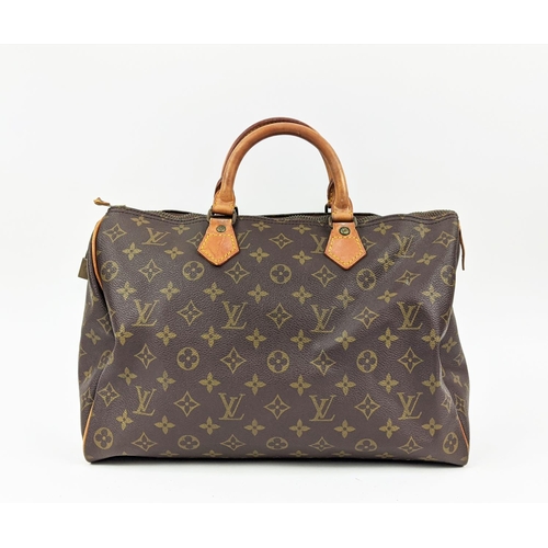 59 - LOUIS VUITTON VINTAGE SPEEDY 35 BAG, monogram coated canvas with leather trims and handles gold bras... 