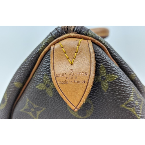 59 - LOUIS VUITTON VINTAGE SPEEDY 35 BAG, monogram coated canvas with leather trims and handles gold bras... 