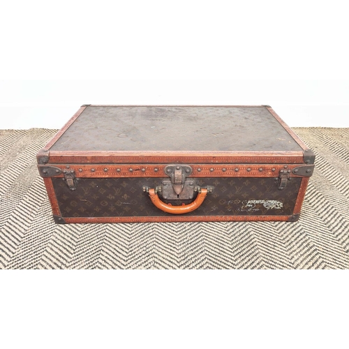 7 - LOUIS VUITTON VINTAGE HARD SUITCASE, monogrammed with leather handles and trims main compartment wit... 