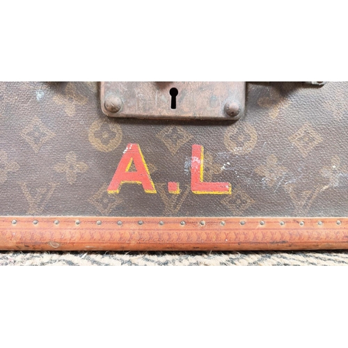 7 - LOUIS VUITTON VINTAGE HARD SUITCASE, monogrammed with leather handles and trims main compartment wit... 