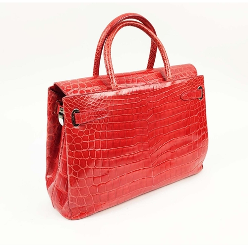 70 - ASPREY 36 BURNT ORANGE DARCY CROCODILE BAG, top handles, signature clasps on side straps, push butto... 