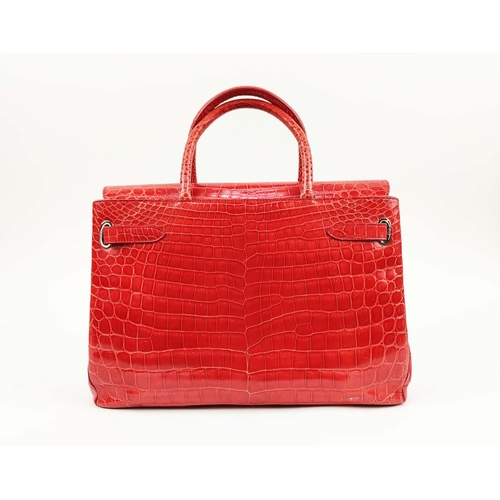 70 - ASPREY 36 BURNT ORANGE DARCY CROCODILE BAG, top handles, signature clasps on side straps, push butto... 