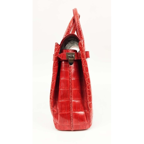 70 - ASPREY 36 BURNT ORANGE DARCY CROCODILE BAG, top handles, signature clasps on side straps, push butto... 