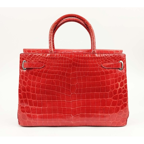 70 - ASPREY 36 BURNT ORANGE DARCY CROCODILE BAG, top handles, signature clasps on side straps, push butto... 