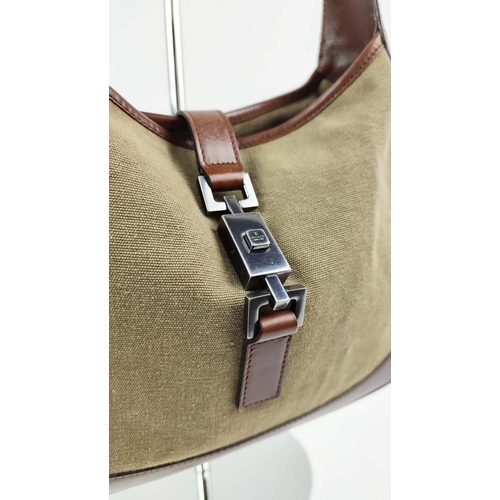 71 - GUCCI JACKIE SHOULDER BAG, canvas with leather strap and trims, open top with strap and push lock cl... 