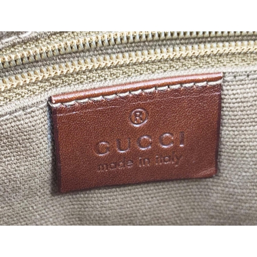 71 - GUCCI JACKIE SHOULDER BAG, canvas with leather strap and trims, open top with strap and push lock cl... 