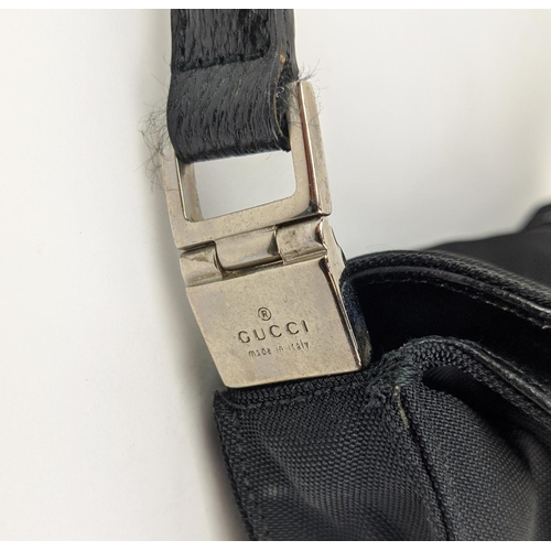 72 - GUCCI NYLON SHOULDER BAG, with leather trims and top single handle, silver tone hardware, push lock ... 